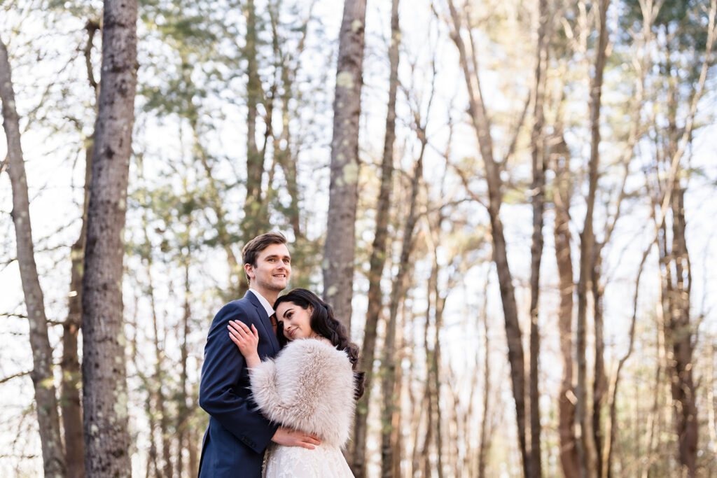 Couples are hugging each other during her elopement wedding.