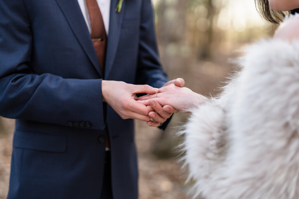 exchange rings during an elopement wedding.