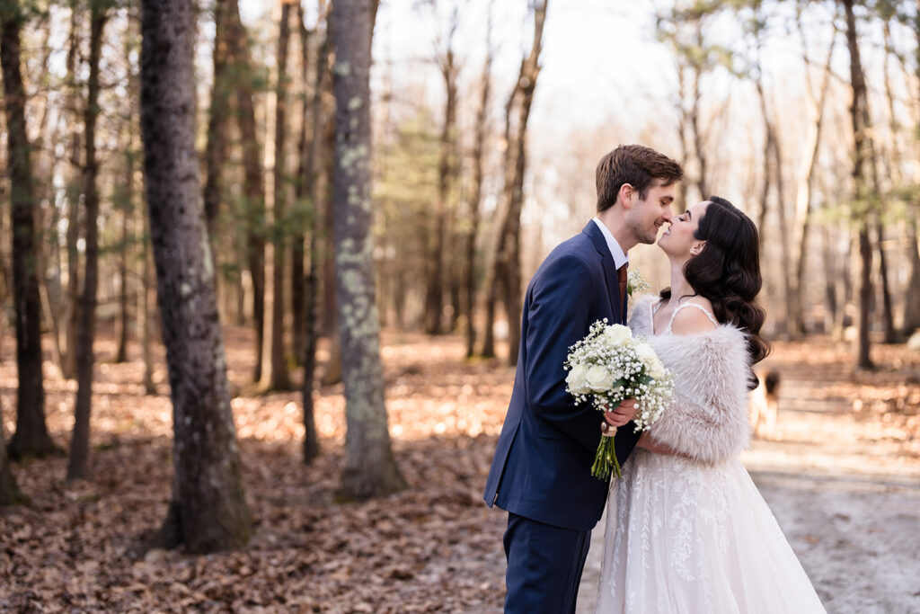 Newly married couples and their first kiss during an elopement wedding.